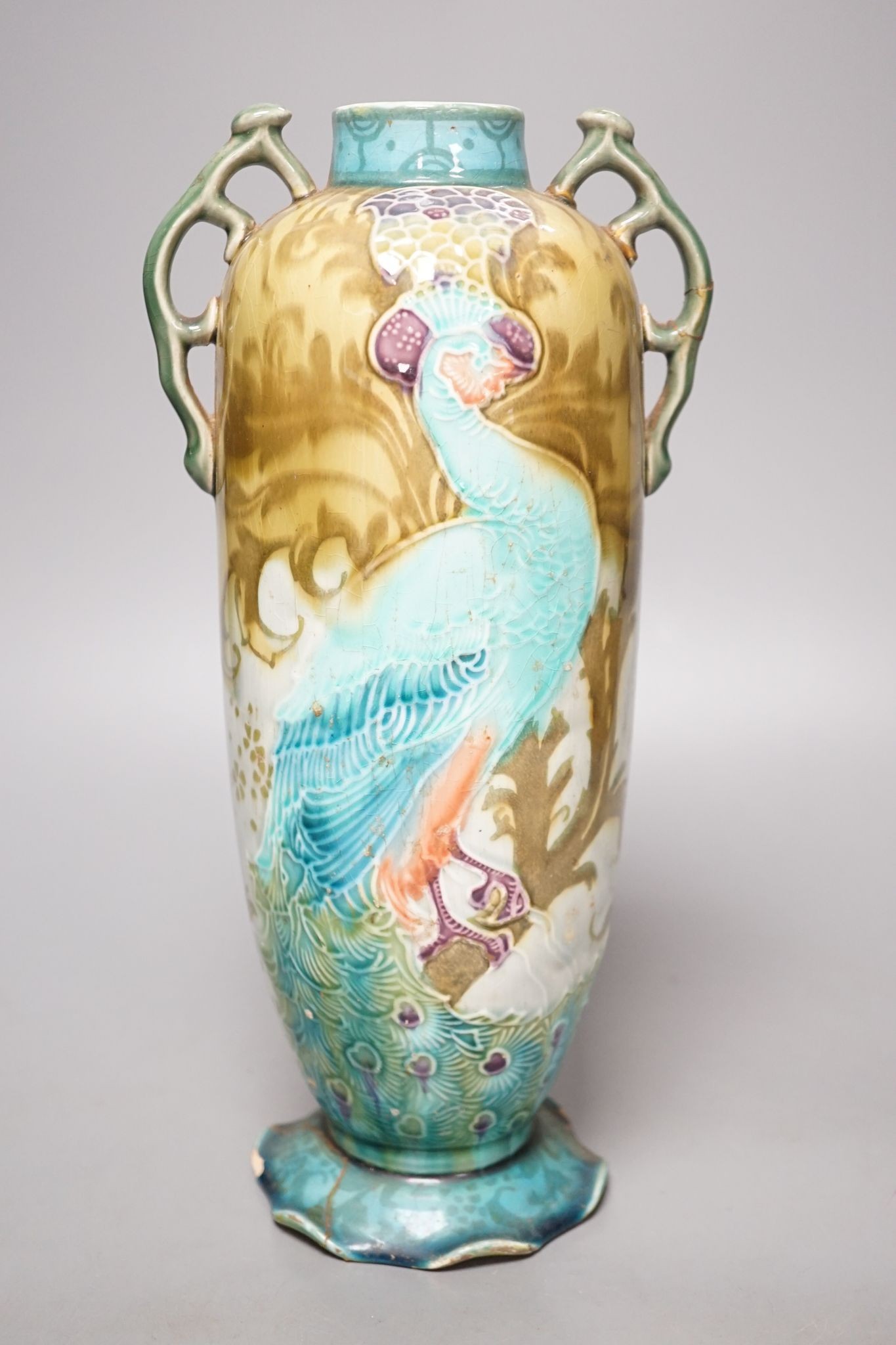 An Art Nouveau/Secessionist style Mintons ‘peacock’ vase (a.f.) 29cm